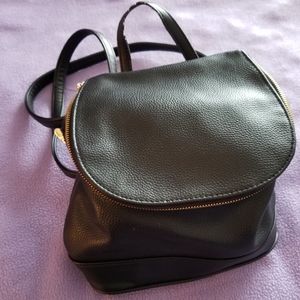 Ladies black backpack purse
